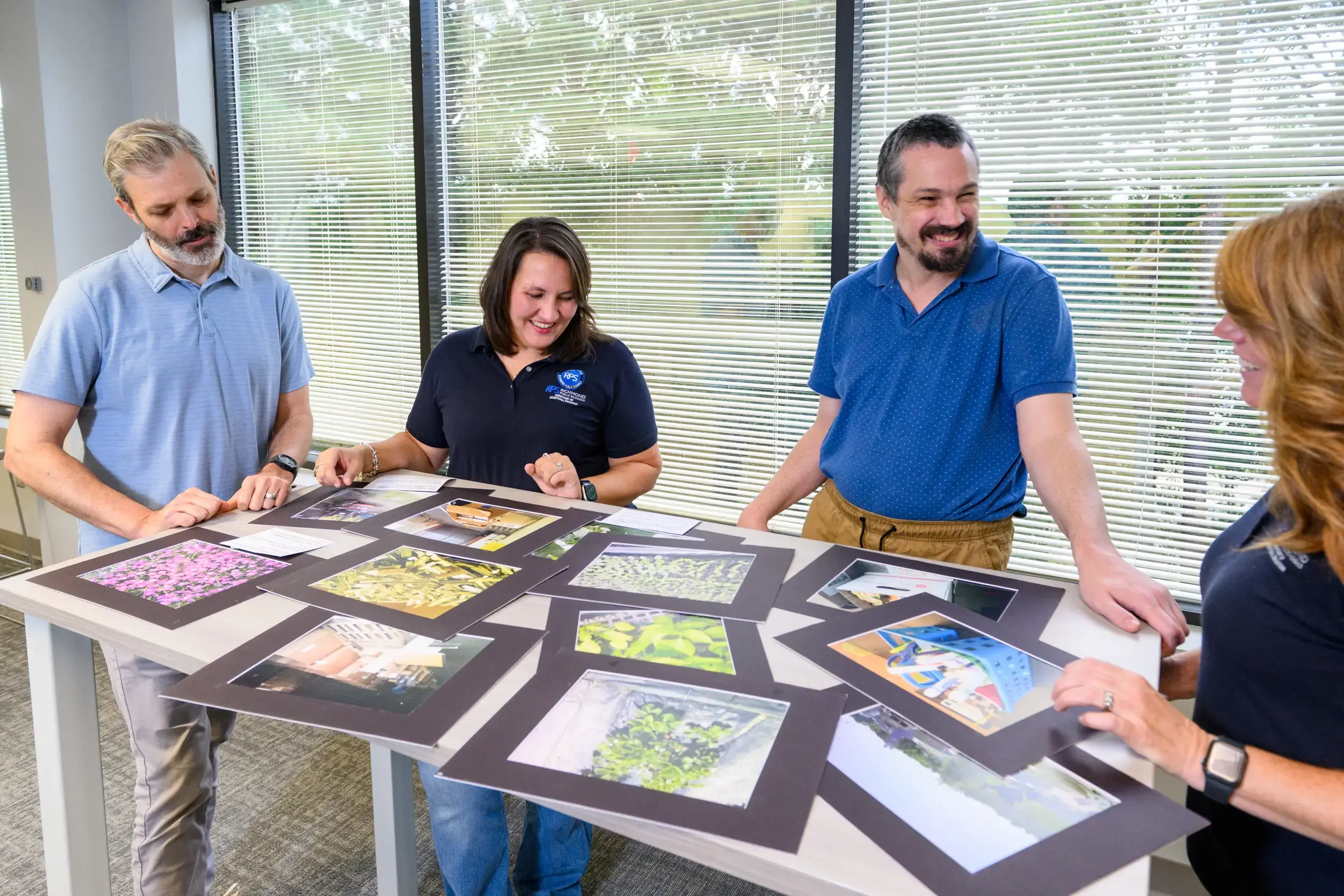 VCU researchers Seb Prohn, Ph.D., and Richard Chapman, Ph.D., and Richmond Public Schools mentor teachers Amanda Dailey and Tammy Sellers have all played a key role in the implementation of the photovoice program in classrooms around the area. (Jonathan Mehring, Enterprise Marketing and Communications)
