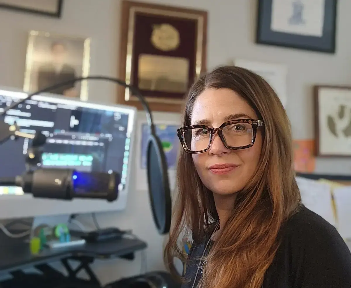 Erin Croyle Recording the Podcast The Odyssey