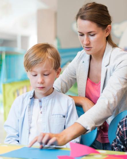 teacher working with a preteen